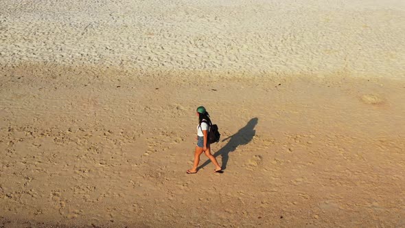 Women posing on idyllic bay beach lifestyle by blue lagoon and white sandy background of Thailand af alt