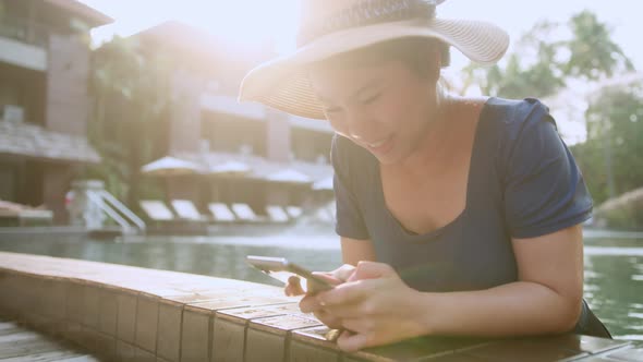 asian female traveller wear casual cloth dress enjoy vacation sunset moment alt