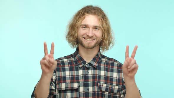 Slow Motion of Friendly Handsome Guy with Blond Wavy Hair and Beard Express Peaceful and Positive