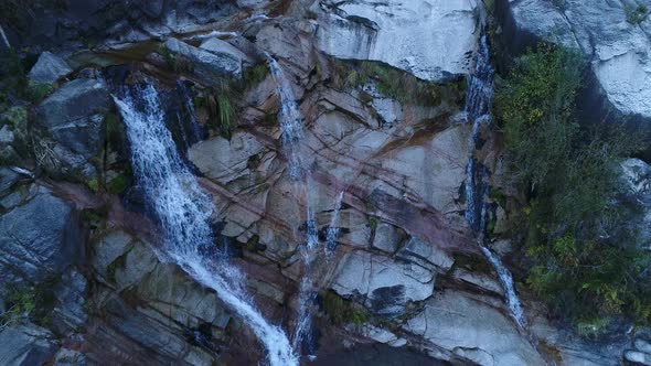 Waterfall Flowing From Rocks alt