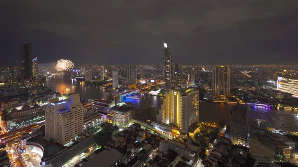 Happy New Year Fireworks Festival Event at Taksin bridge with Chao Phraya River in Bangkok, Thailand alt
