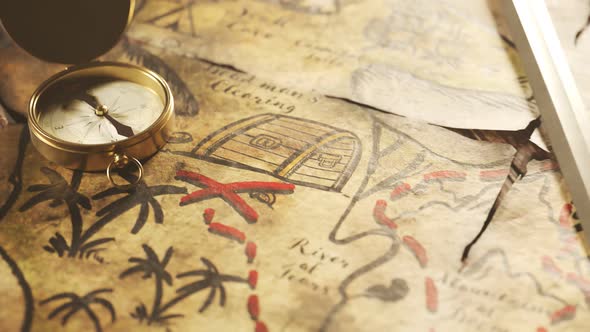 Old, worn handmade treasure map on a cartoon tavern table with sword and compass alt