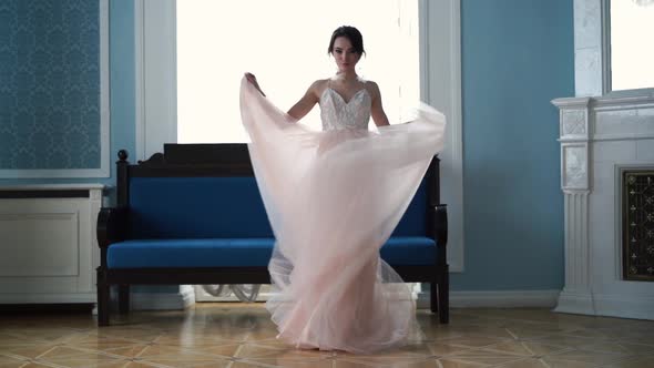 Beauty Slowmotion - Beautiful Bride Is Spinning in a Wedding Dress