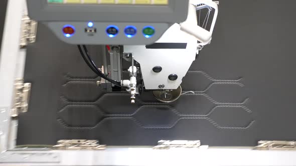 Robotics Works in the Tailoring Production Line alt