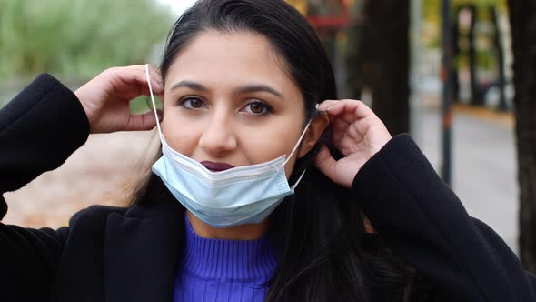 Young woman wears surgical mask8