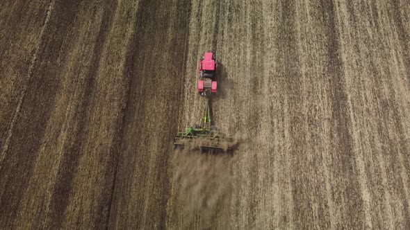 Cultivation of Soil By Tractor View From a Height