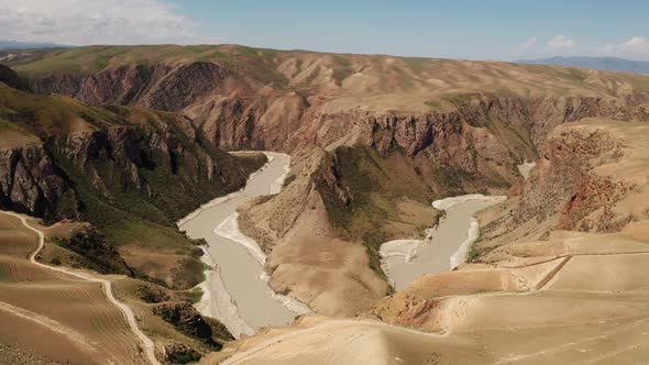 Grassland and river in a sunny day alt