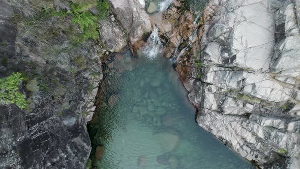 Natural pool of Portela Do Homem in Peneda-Geres National park, Portugal. Aerial top-down descending