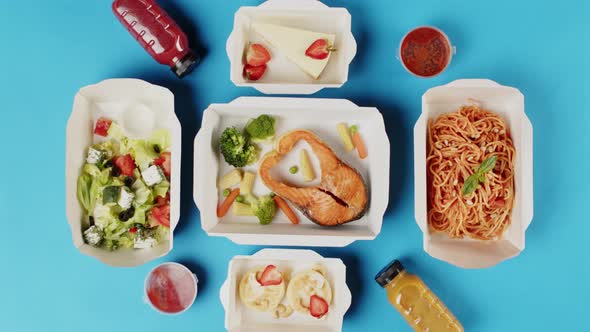 Food Delivery Top View Take Away Meals in Disposable Containers on Blue Background alt