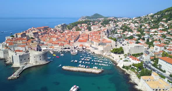 Aerial View on the Old City in Dubrovnik, Croatia, Drone Goes Above the Lagoon