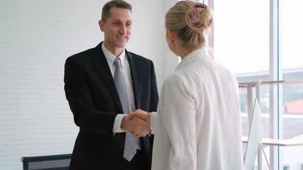Job Seeker and Manager Handshake in Job Interview alt