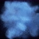 Blue powder/particles fly after exploded on black background. Slow Motion. 4K 30fps. Slow Motion. - VideoHive Item for Sale