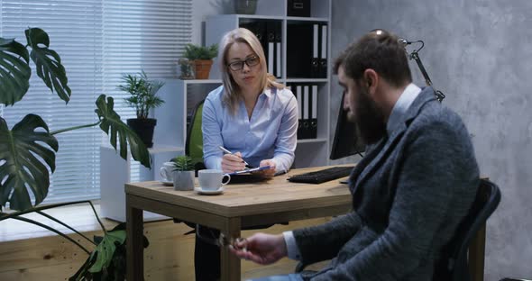 Young Man Talking To Psychologist alt