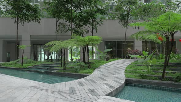 Decorative Garden at the Bottom of Apartment Block alt