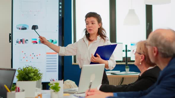 Young Businesswoman Coach Leader Conference Speaker Giving Business Presentation alt