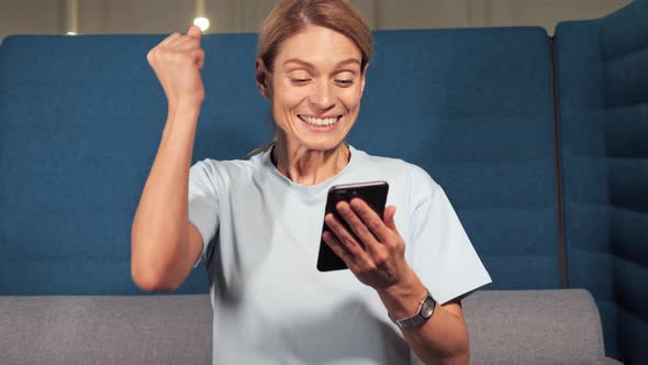 Businesswoman Receiving New Successful Project alt