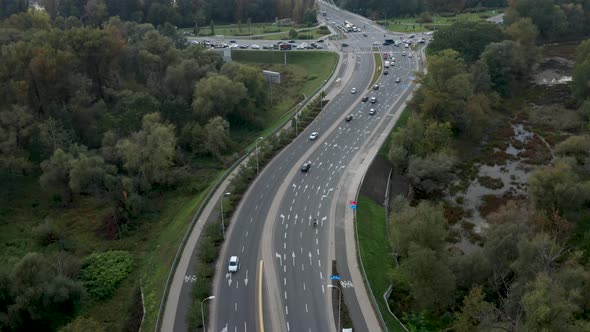Aerial drone view of Warsaw skyline, Świętokrzyski Bridge and road junction in the foreground. Warsa alt