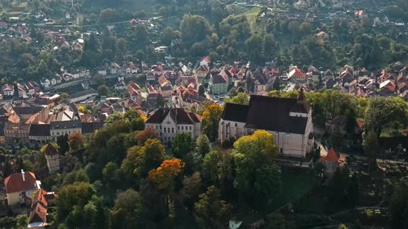 Aerial drone view of the Historic Centre of Sighisoara, Romania. Old buildings alt