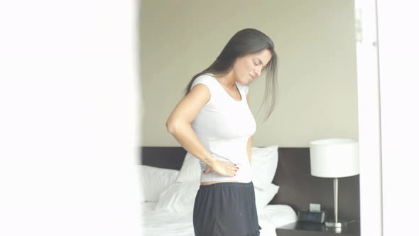 Woman suffering from stomachache