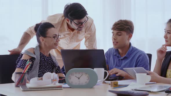 Group Meeting of Creative Business People Designer and Artist at Office Desk alt