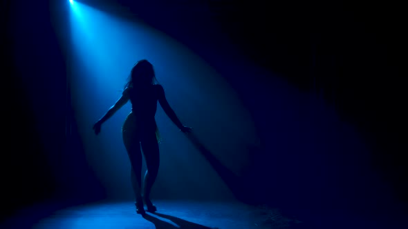 Man Dancing Latin Music. Bachata, Merengue, Salsa. Shot in a Dark Studio with Neon Lights in the alt