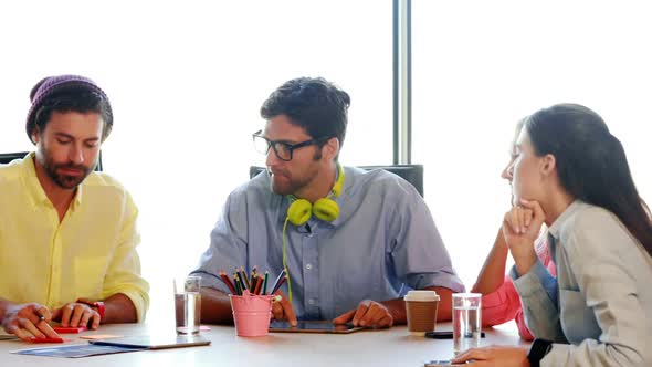 Businesspeople having a discussion alt