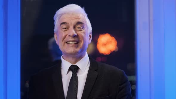 Happy Old Gentleman in Blazer Necktie Looks at Camera and Smile alt
