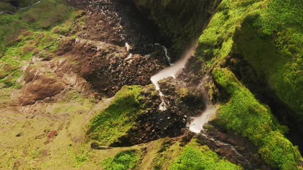 Waterfall Flowing Down Mountain of Poco Ribeira Do Ferreiro Flores Island alt