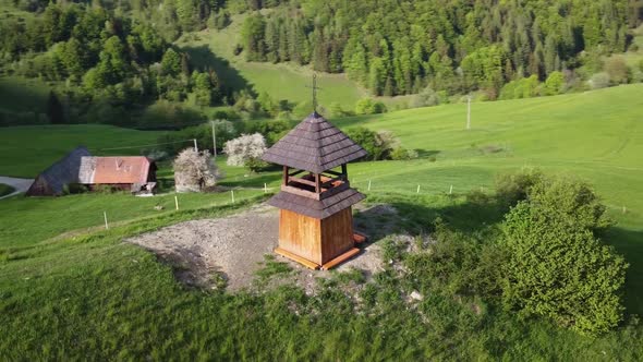 Christian Bell Tower a Chapel on a Green Hill in the Countryside