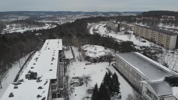 Residential Block Buildings Covered with Snow Urban Area Low Aerial