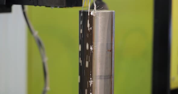 EDM CNC Machine While Cutting the Sample Work Pieces alt