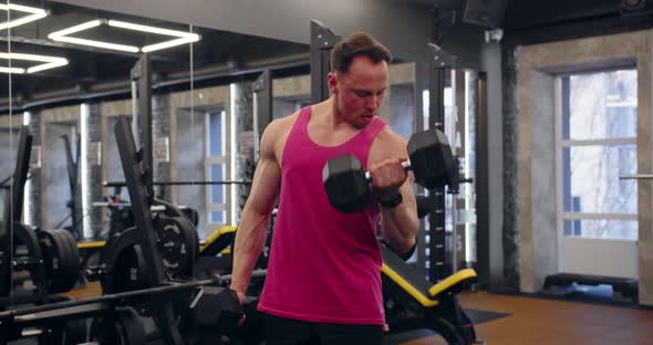 Bodybuilder Doing Arms Exercises In Gym Naked Torso. Handsome Power Athletic Man In Training alt