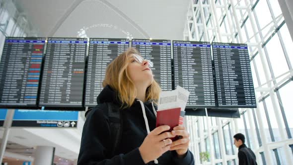 Young Woman Travel Abroad. Tourist Go Home Airport alt
