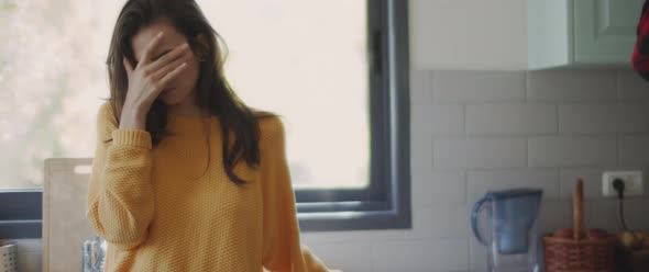 Woman feeling upset and hurt while having a fight with her boyfriend. alt