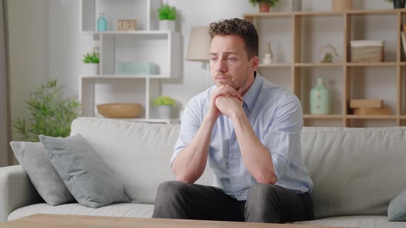 Disappointed Man Sit on Sofa Thinks Looks Sad Frustrated Deeply Unhappy Feels Moral Badly After alt