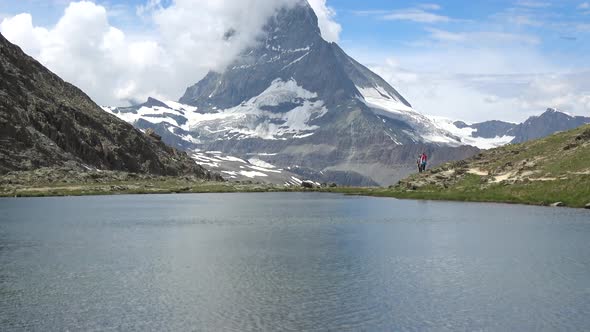 Scenic view on snowy Matterhorn peak and lake Stellisee, Swiss Alps, Zermatt