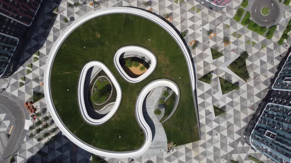 Aerial Top View of Street with Parking Lot Near New Residential Housing Complex alt