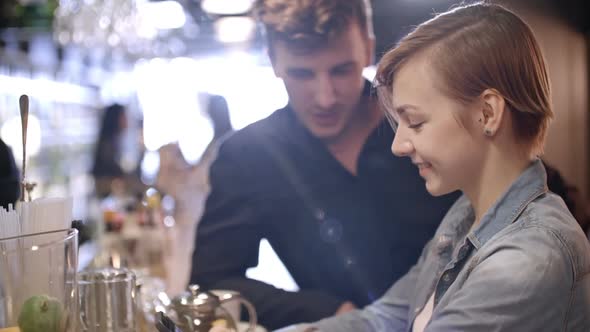 Man Flirting with Woman in Bar alt