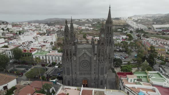 Aerial View Of Church of San Juan Bautista. Pedestal Up, Tilt Down, Dolly Back Reveal alt