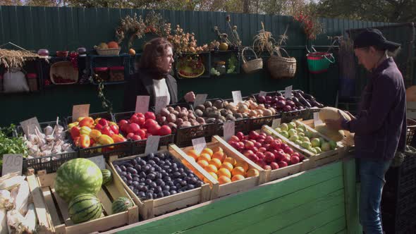 Buying Fruit at the Market.