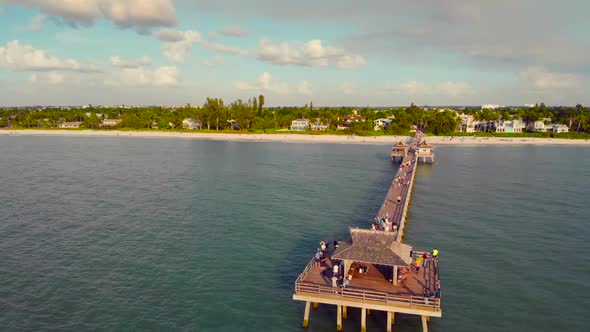 Naples Beach and Fishing Pier at Sunset, Florida alt