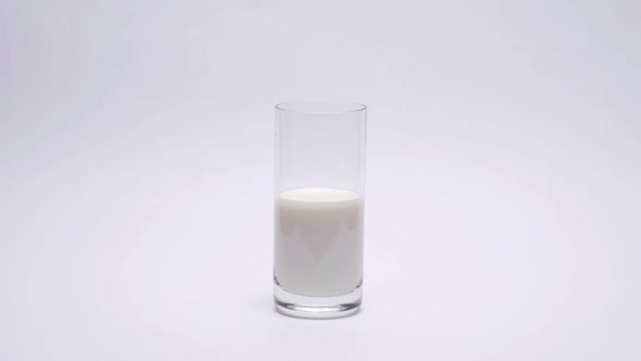 Glass Of Fresh Milk On A White Background