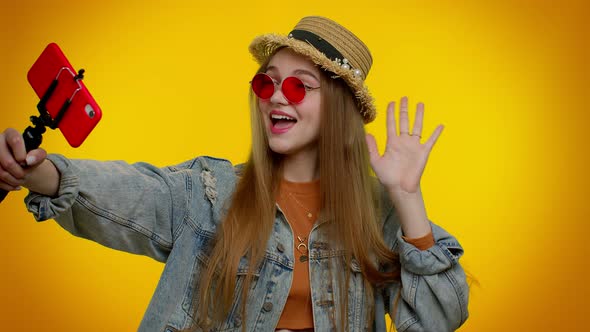 Girl Traveler Blogger in Sunglasses Taking Selfie on Mobile Phone Communicating Video Call Online alt