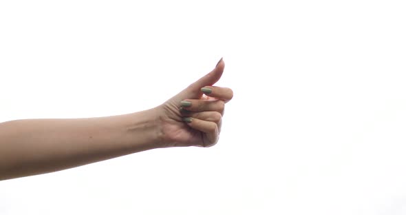 Closeup of Female Hand Snapping Fingers on a White Background