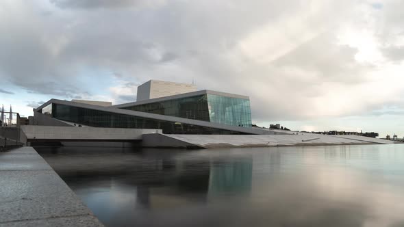 White Clouds Rolling Over The Oslo Opera House In Bjorvika, Oslo, Norway. - timelapse alt