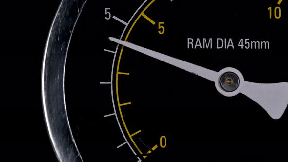 The White Arrow on the Manometer, Pressure Sensor, Drops Down, Indicating That the Pressure Drops alt