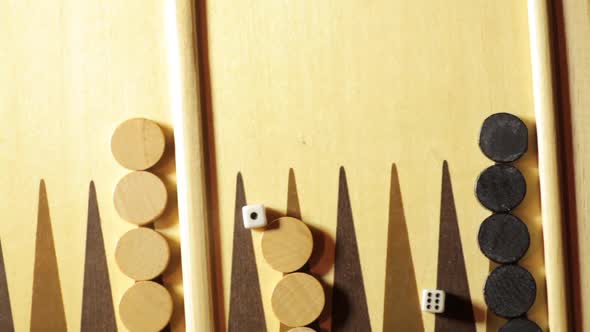 Backgammon board with some rolling dice