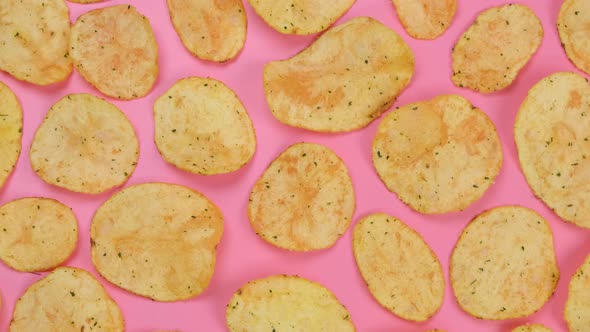 Rotating Pink with Potato Chips Close Up