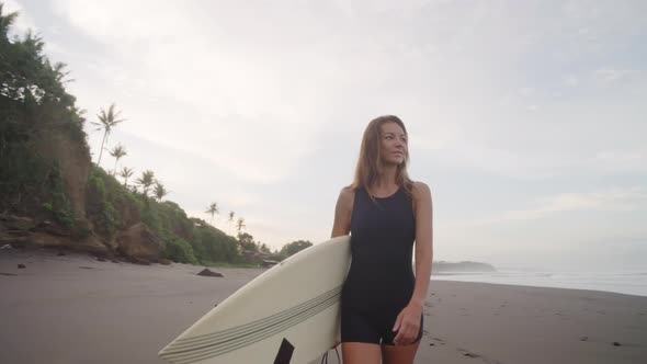 Walking Relaxed Along Beach alt
