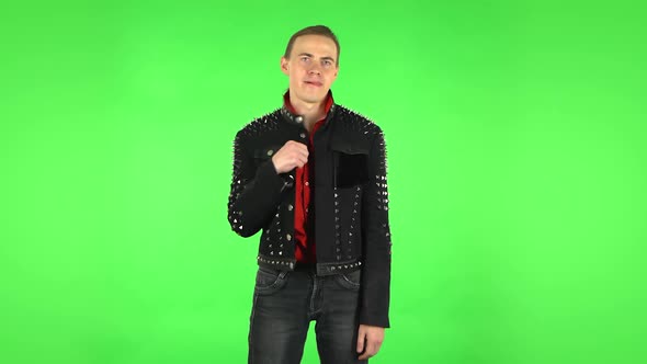 Guy Cooling Herself By His Hand, Suffering From High Temperature Weather. Green Screen alt